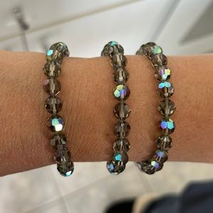 Swarovski iridescent set of three grey family.